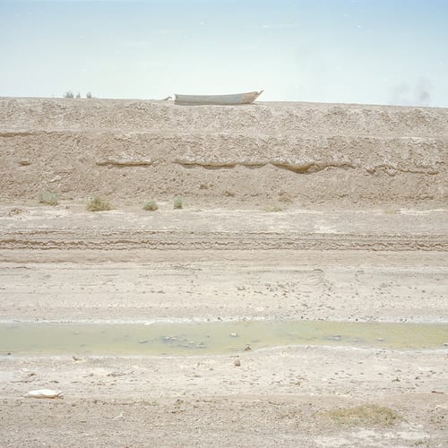 The Adimi, Dehno (new village), Sistan. Here is part of the Helmand water, which once entered the city for the use of people, but it is dried up now. The fishermen's boats are abandoned here. © Hashem Shakeri